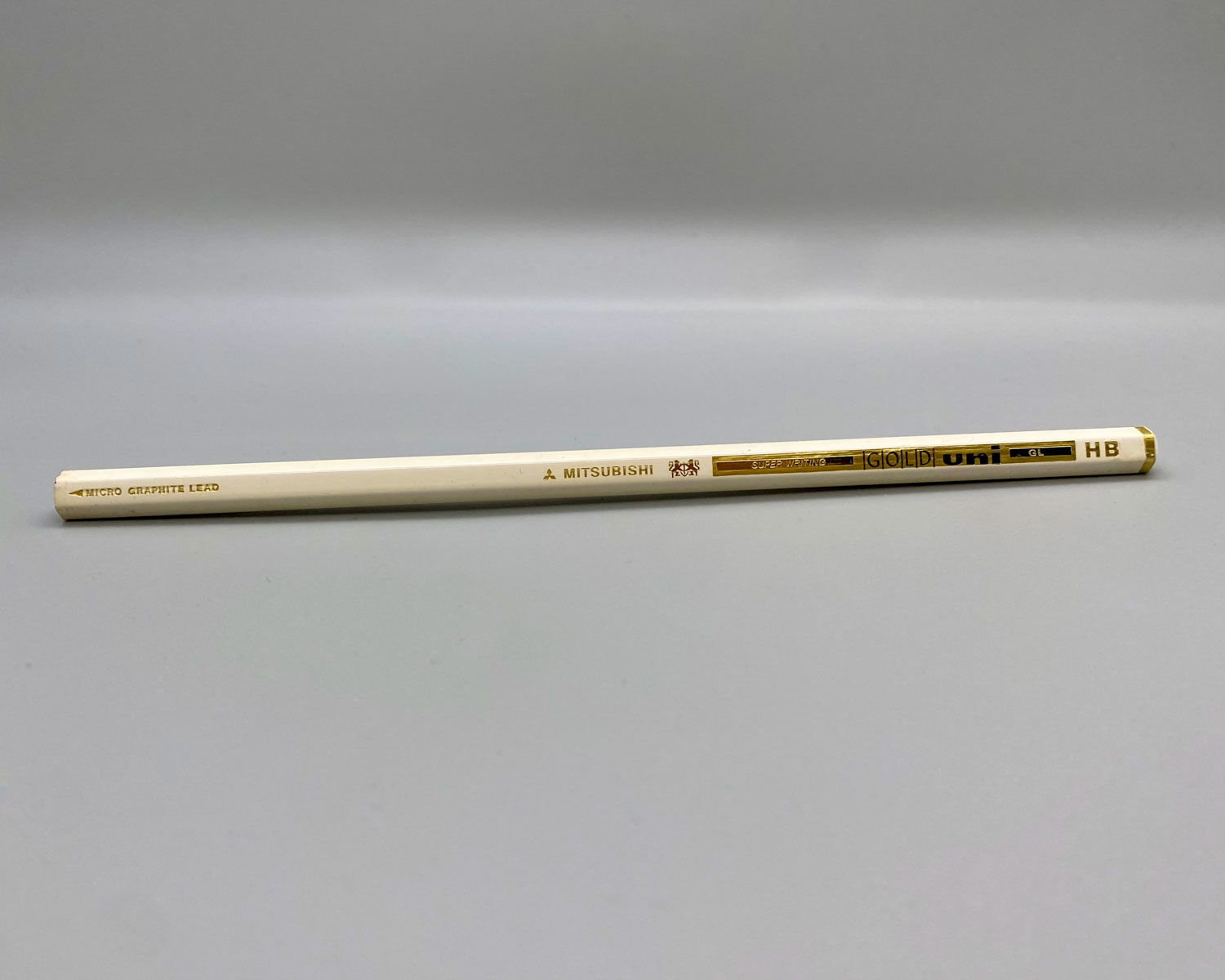 mitsubishi uni super writing gold pencil