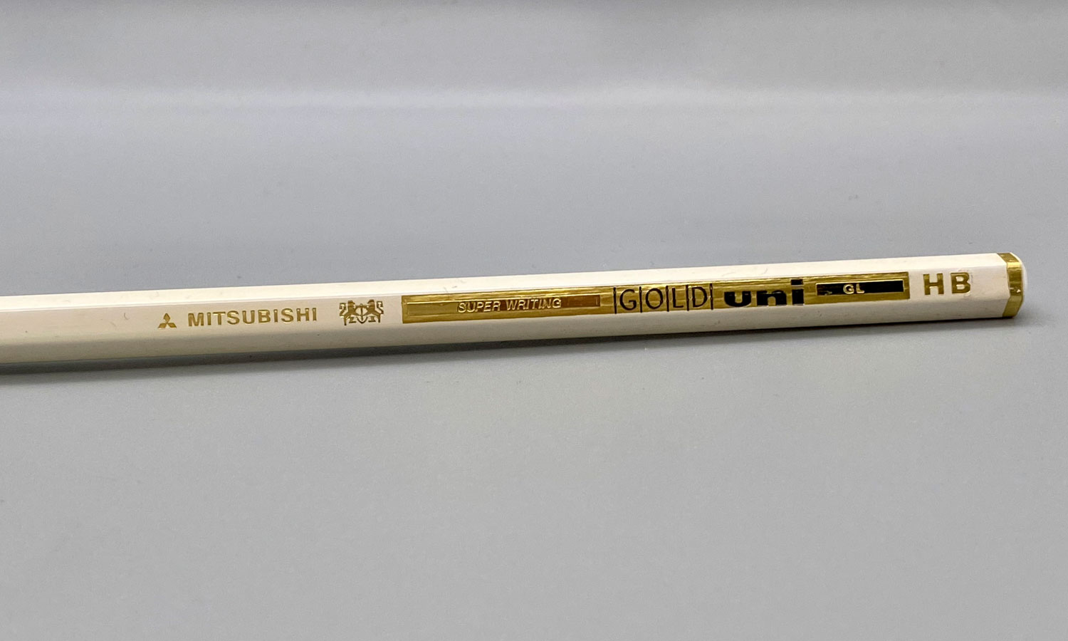mitsubishi uni super writing gold pencil