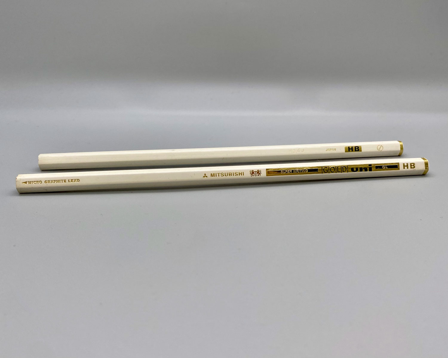 mitsubishi uni super writing gold pencil